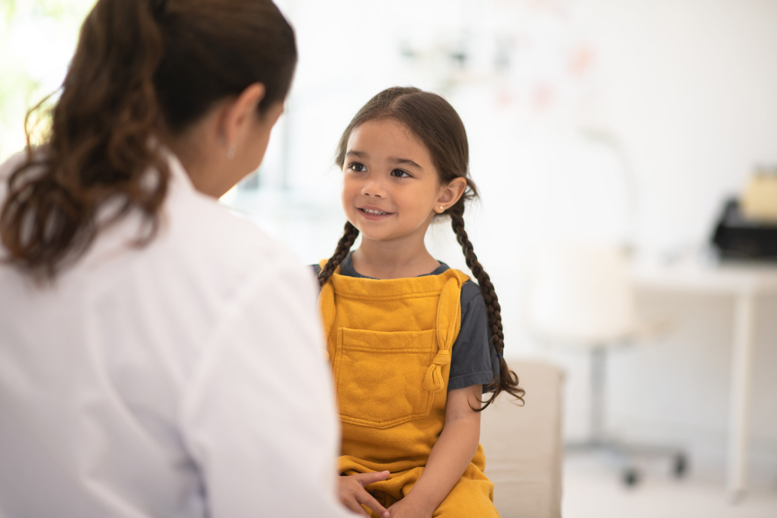 Dr. Vani during a child's check-up